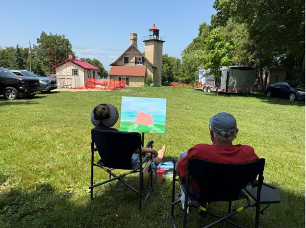 06.23.2025 08 An artist starting a painting of the lighthouse