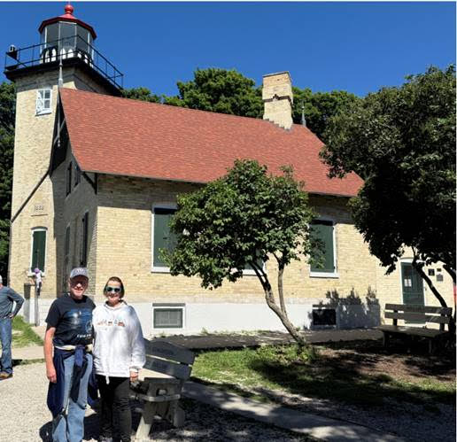 07.17.2025 08 Lighthouse authors Barb and Ken Wardius visit Eagle Bluff Light Station